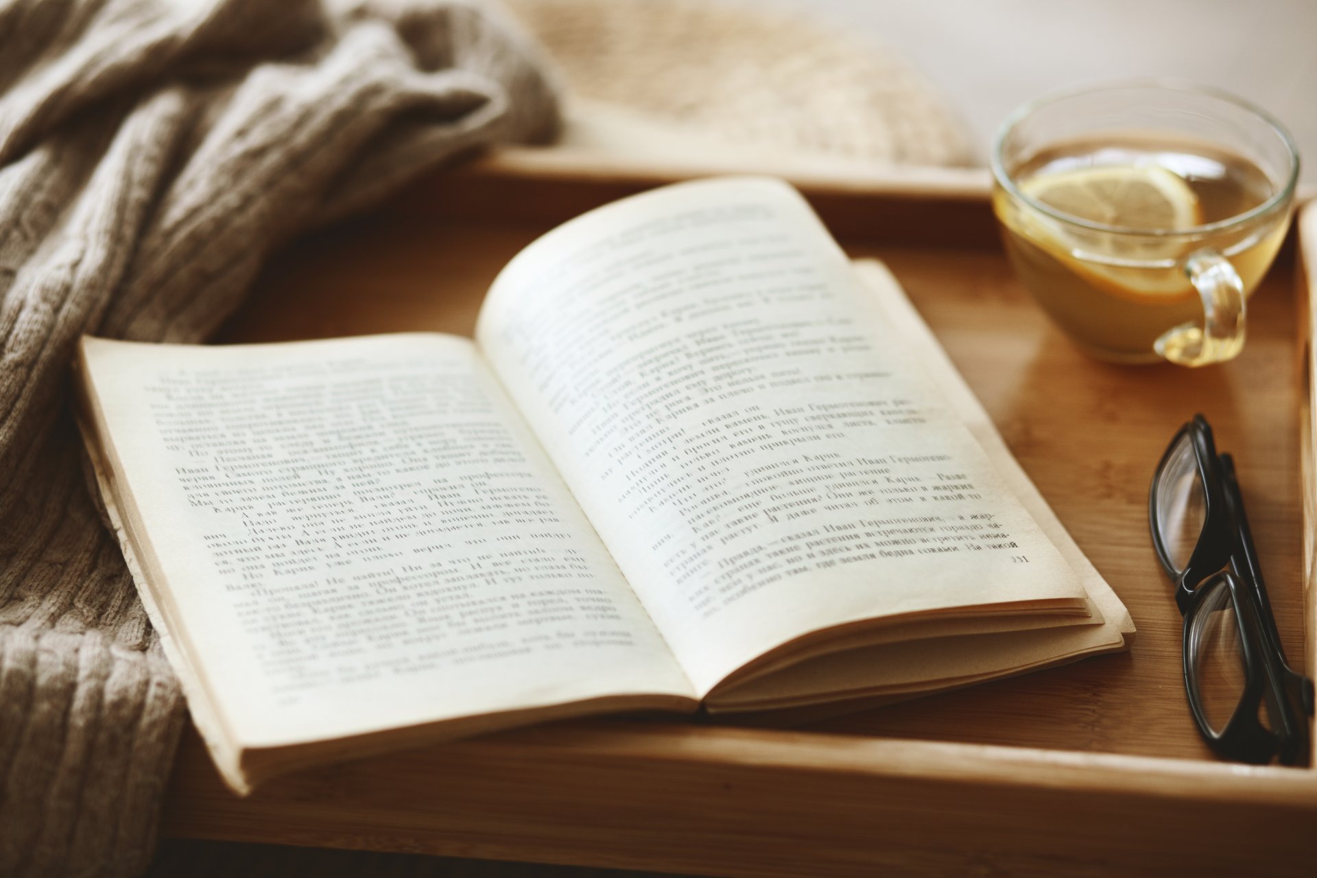 comfort tray book sunglasses tea lemon sweater