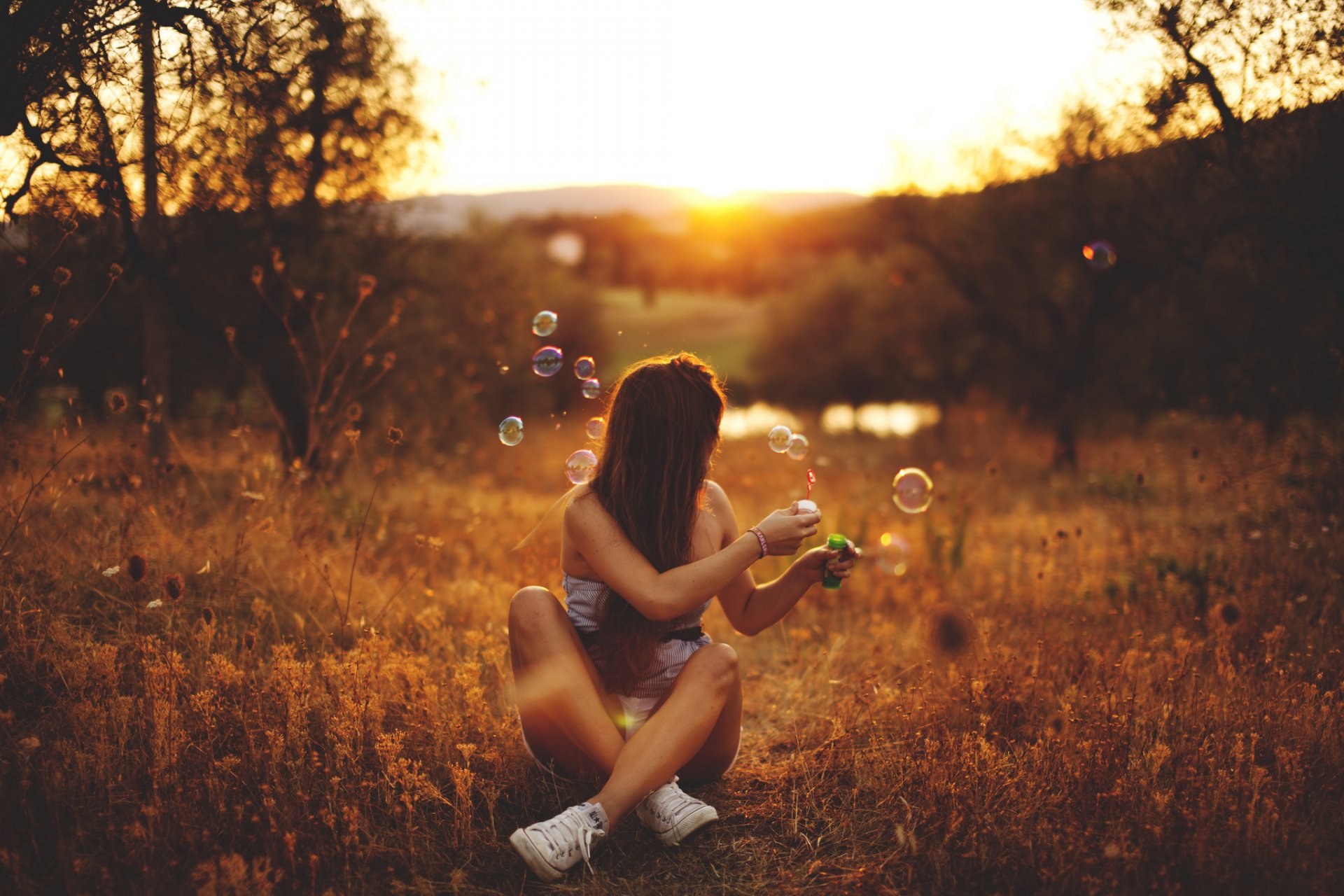 girl soap bubbles pose sitting