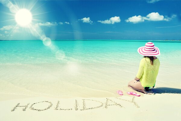 Mädchen am Meer sitzt im Urlaub