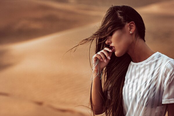 Photo of a girl with makeup in the desert
