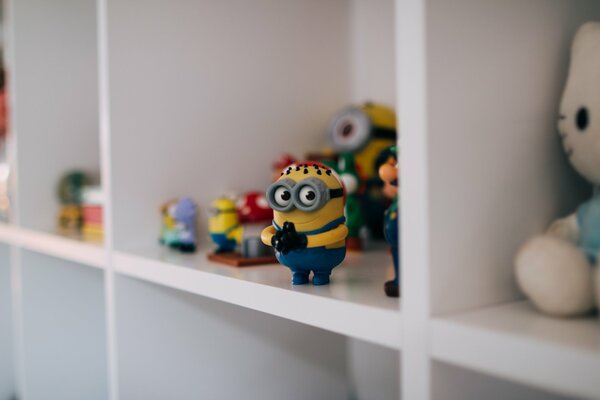 Minion on the shelf with toys
