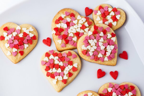 Cookies with multicolored powder in the form of hearts