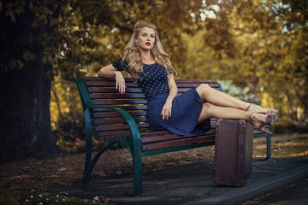 Girl in retro style in the park