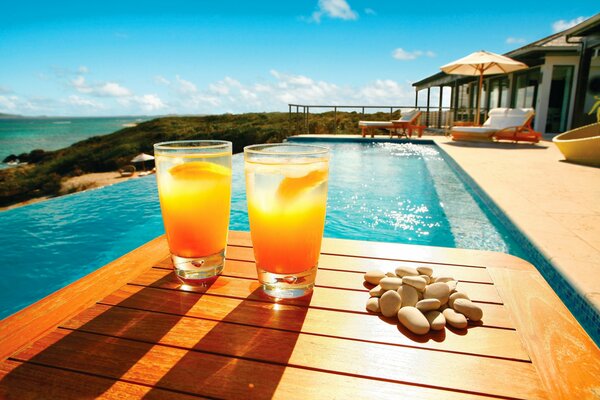 Dream vacation with a cocktail by the pool