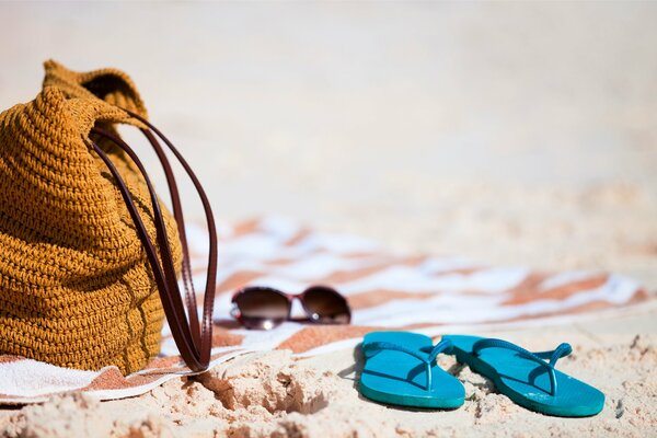 Slates and a bag on the beach