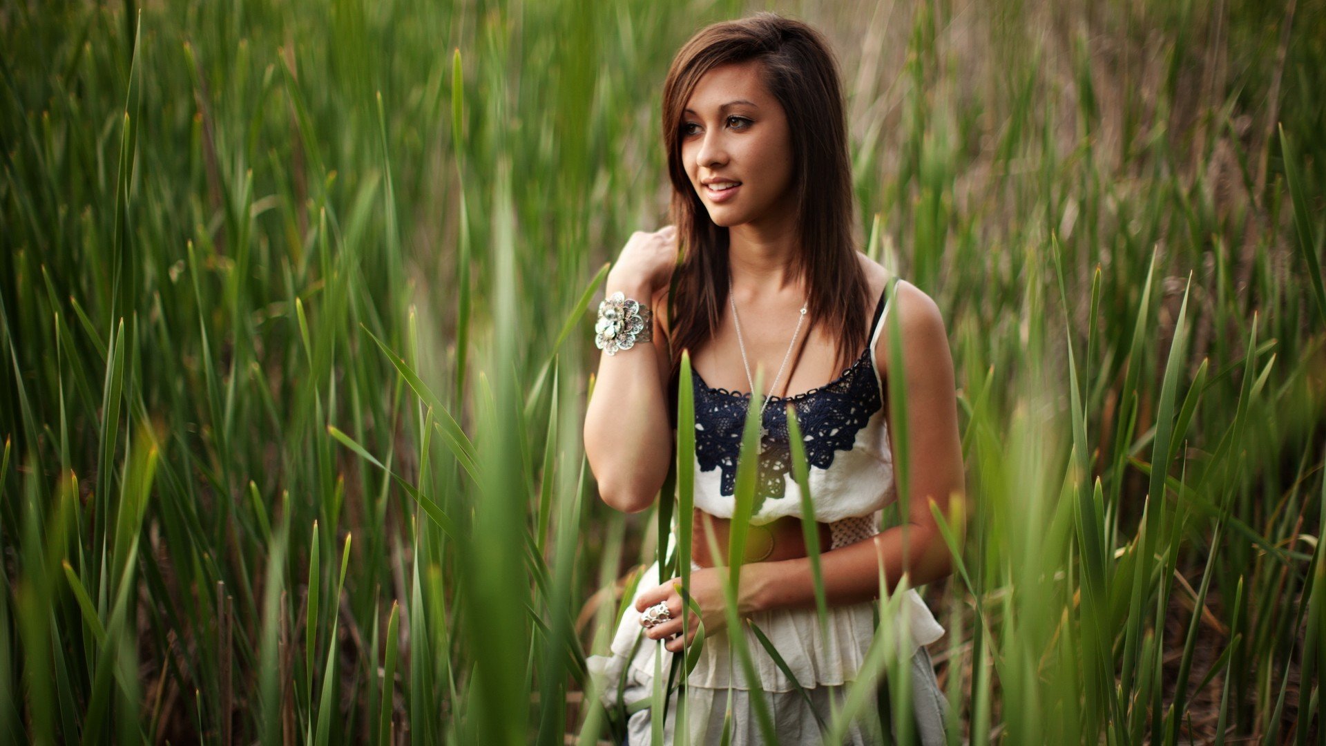 girl brunette smile view nature plant