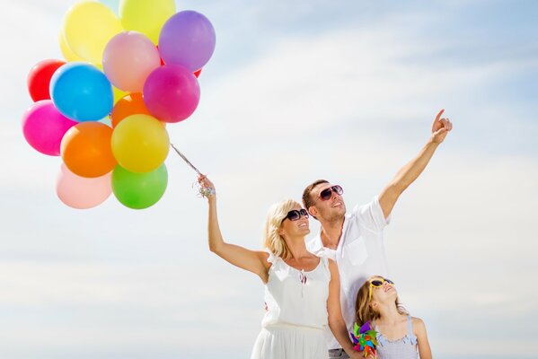 Happiness in the family, children and balloons