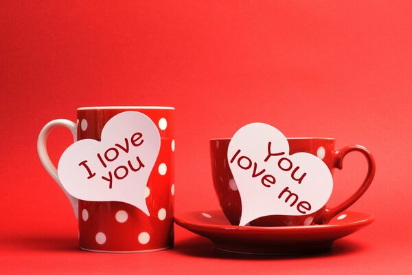 Paired mugs with inscriptions about love