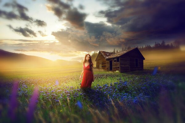 The girl in red in the field