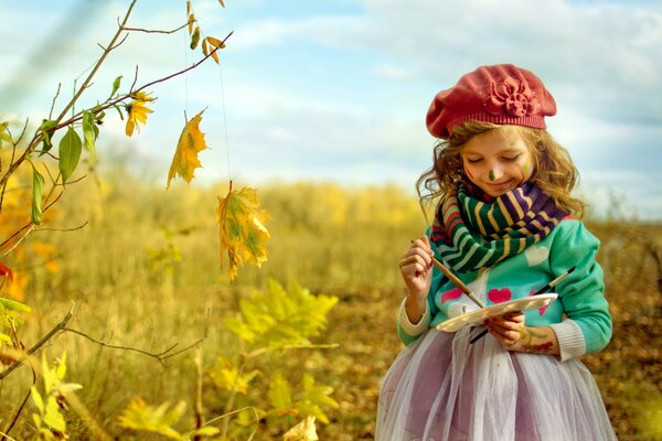 Peintre fille et peinture automne