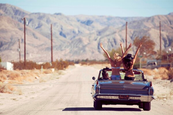 Vacation in the mountains on a convertible