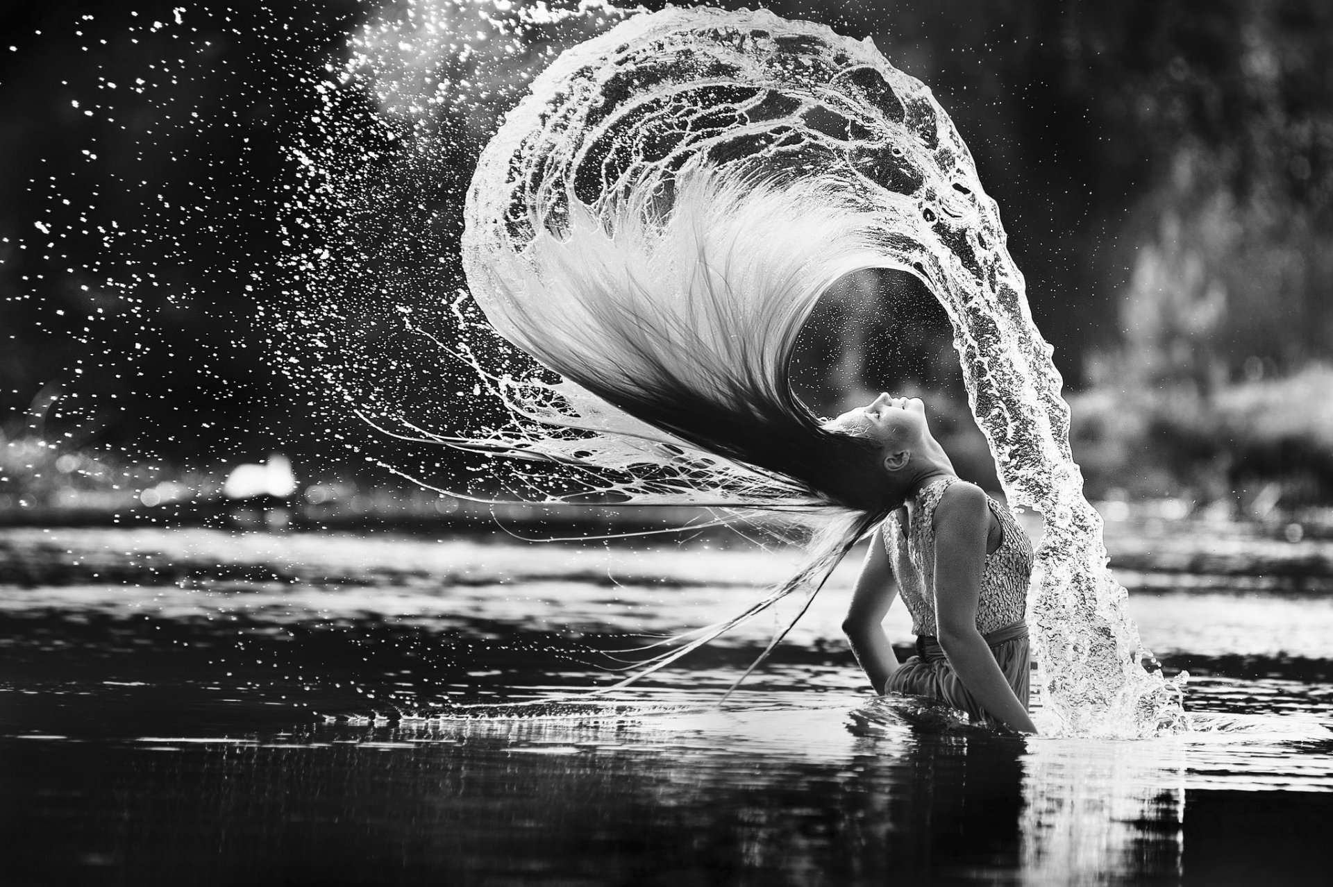 girl in water hair wag splash spray