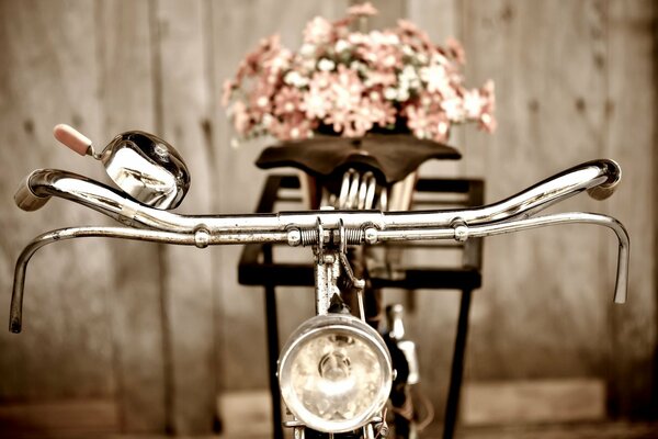 Vintage bicycle with a basket of flowers