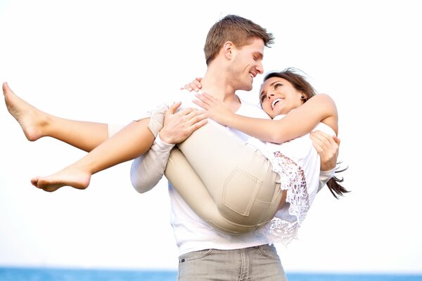 Guy with a girl on the seashore