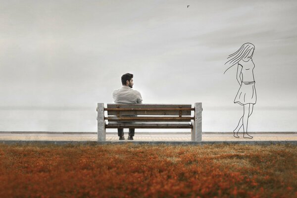 Le gars assis sur un banc, se souvient que sa fille a disparu