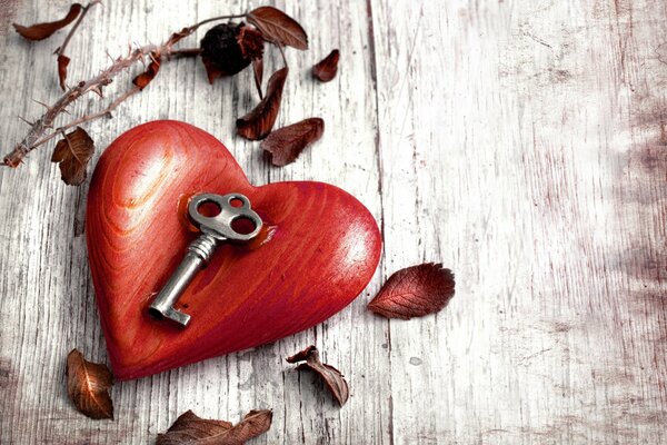 Gift. Wooden heart with a key