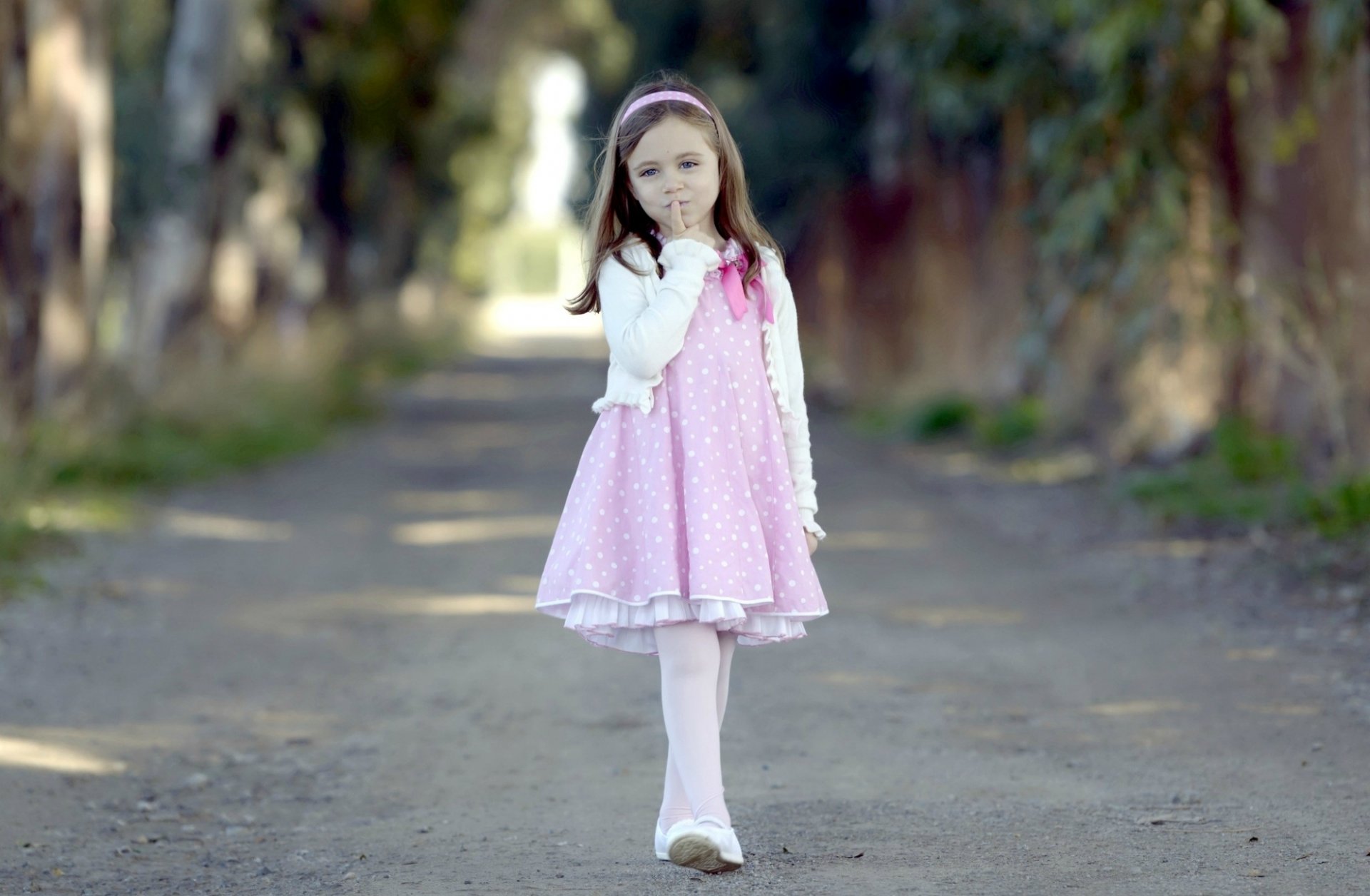 mood kids girl pink dress bow headband ribbon look face finger step walking walk road path trees leaves nature background wallpaper