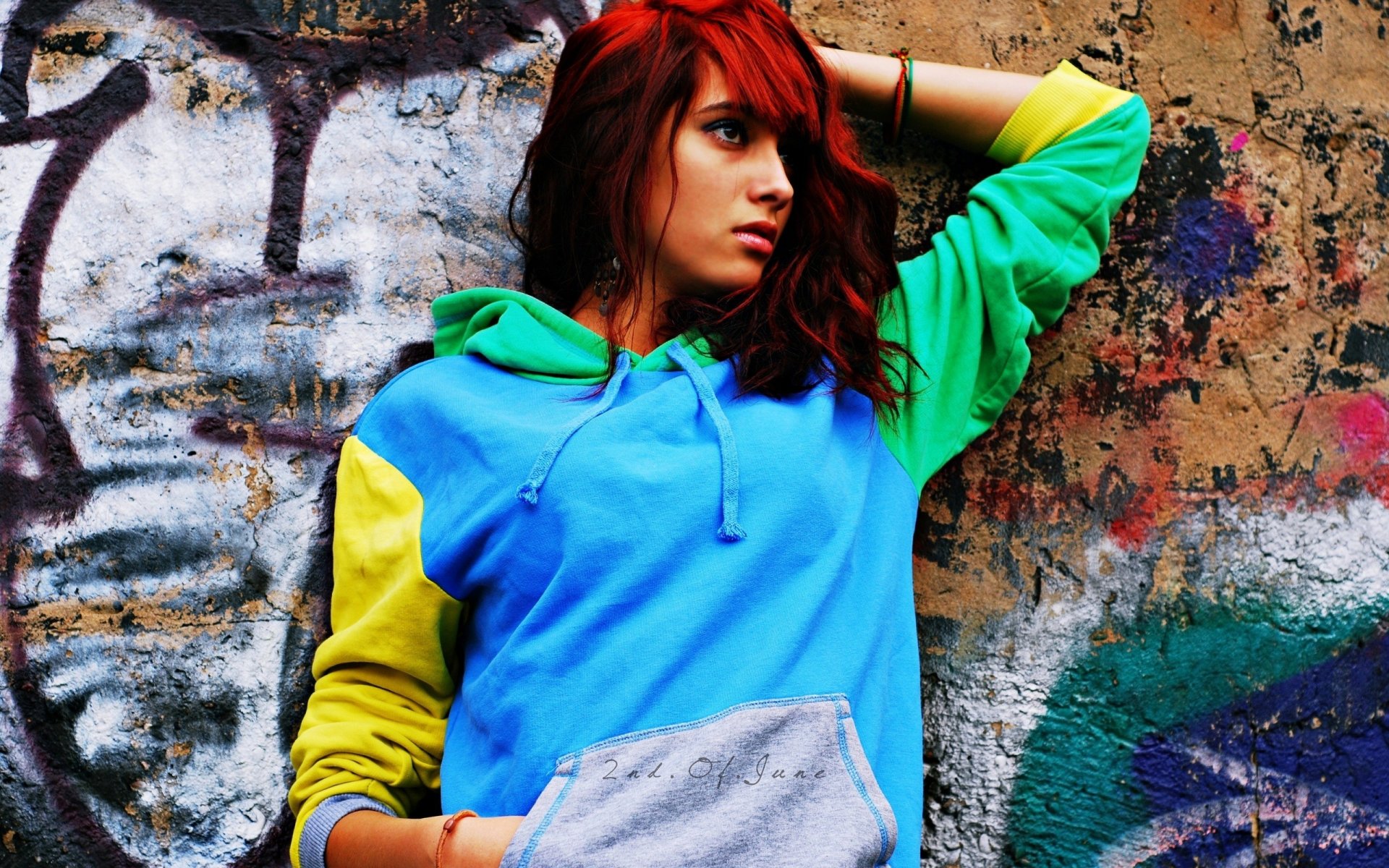 mood girl red hair jacket . bright wall graffiti background wallpaper