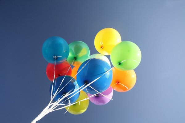 Colorful balloons on the sky background