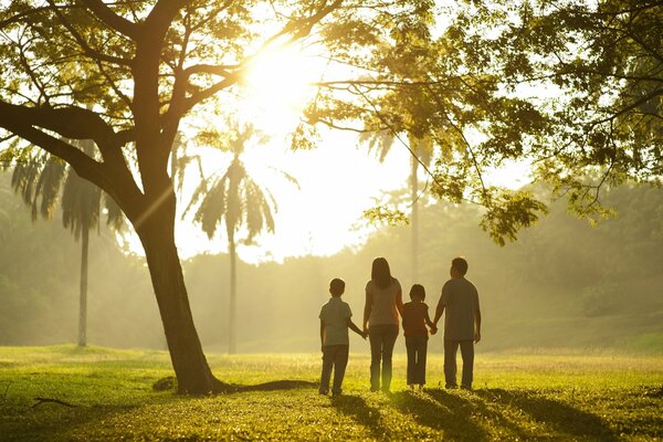 Family with children on a walk in nature