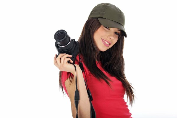 CHICA FOTÓGRAFO CON GORRA