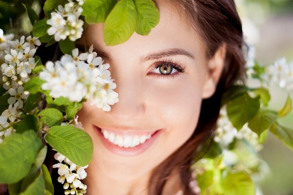 A woman s smile in white colors