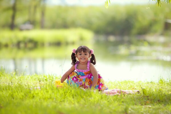 Girl on the background of the water surface