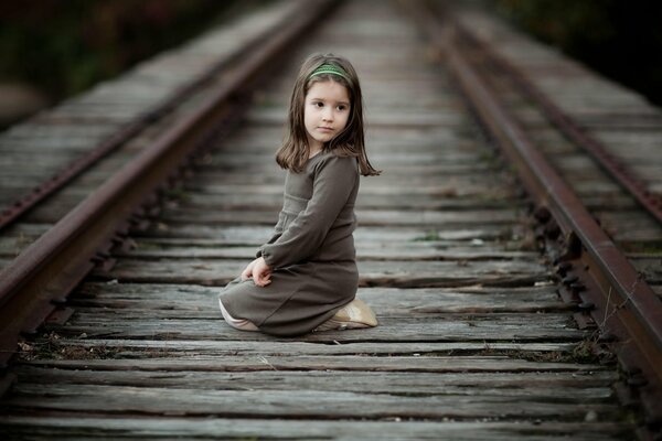 A little girl. The long road