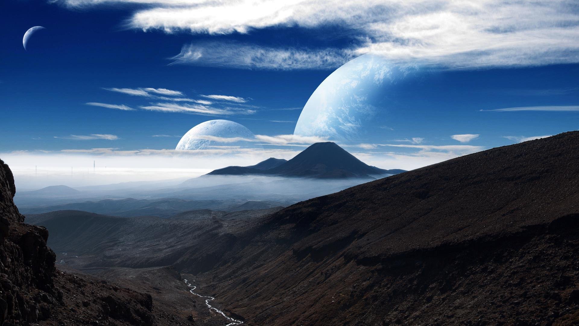 la planète la montagne le ciel les nuages la lune