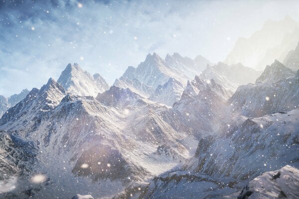 Snowy mountains in a blue fog