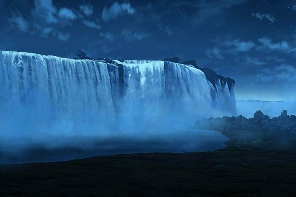 A wide waterfall on the background of the night sky