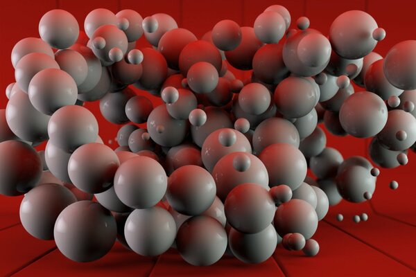 Mismatched gray balls on a red background