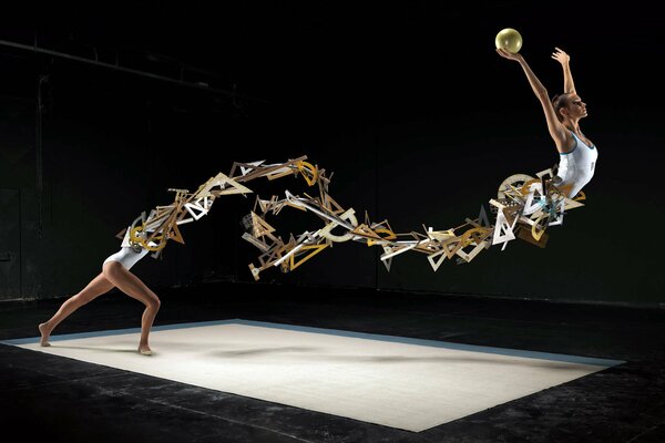 Abstract photo of a gymnast with a golden ball