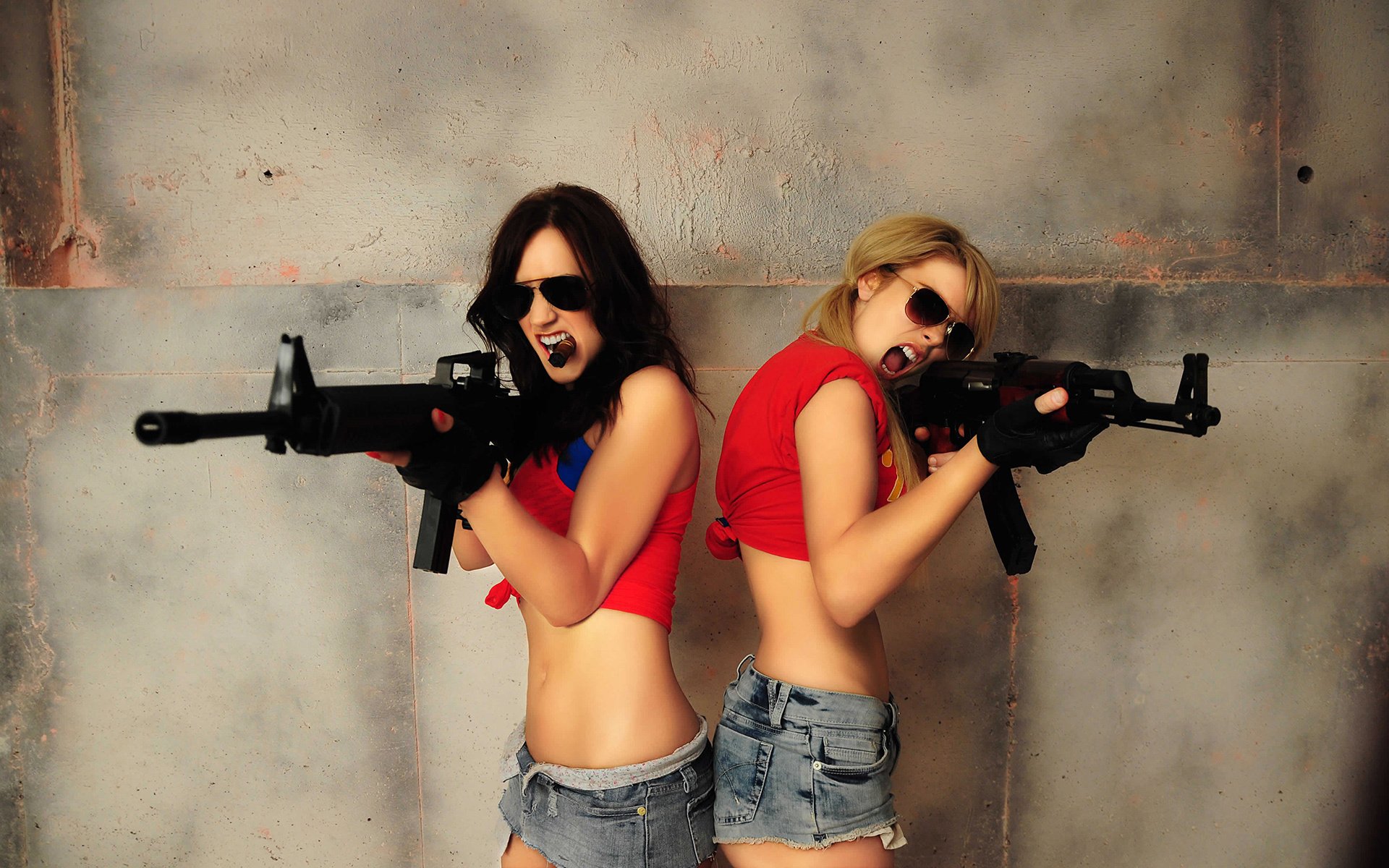 girls brunette blonde cigar weapon sunglasses wall