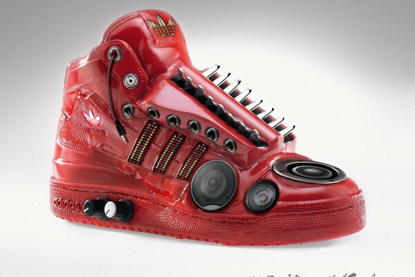 Sneakers con borchie rosse con audio