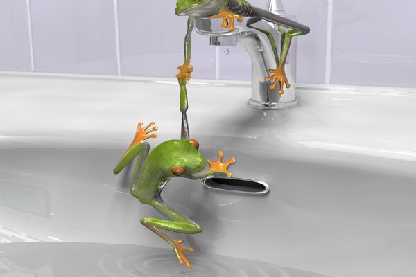 2 green frogs on the sink on the faucet