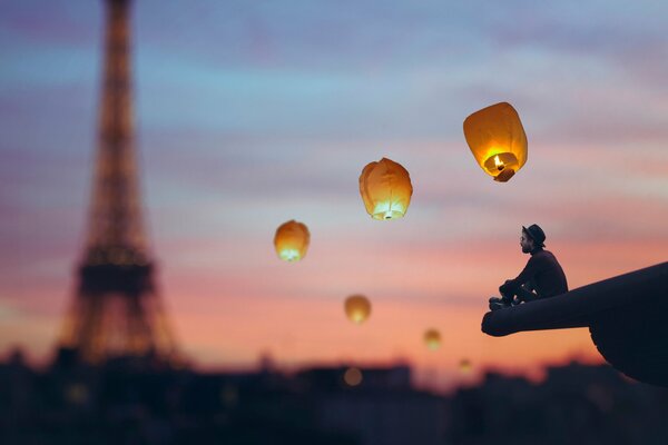 Une belle photo d un homme sur fond de coucher du soleil et de la tour Eiffel