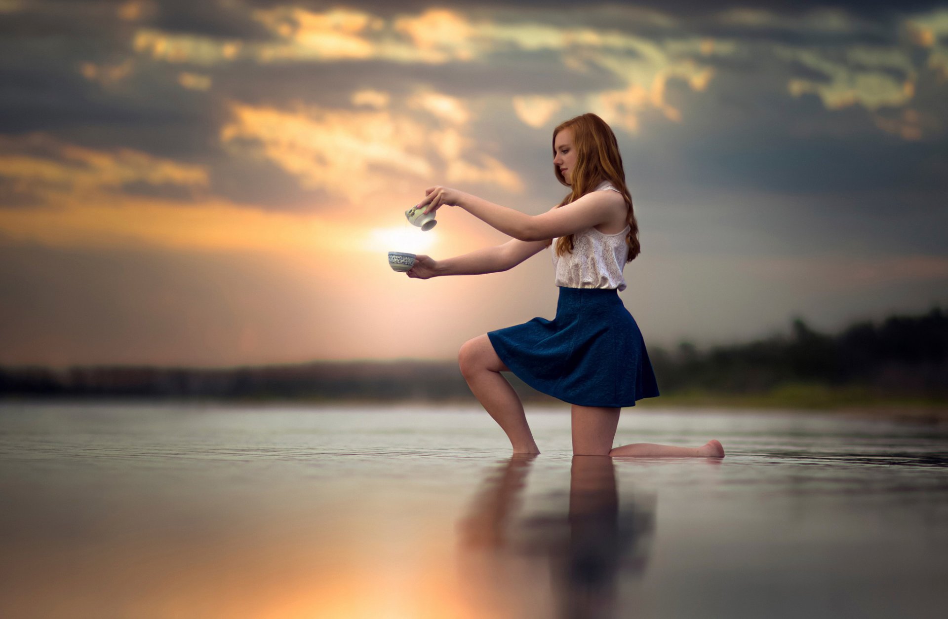 girl in water sunset skirt feet