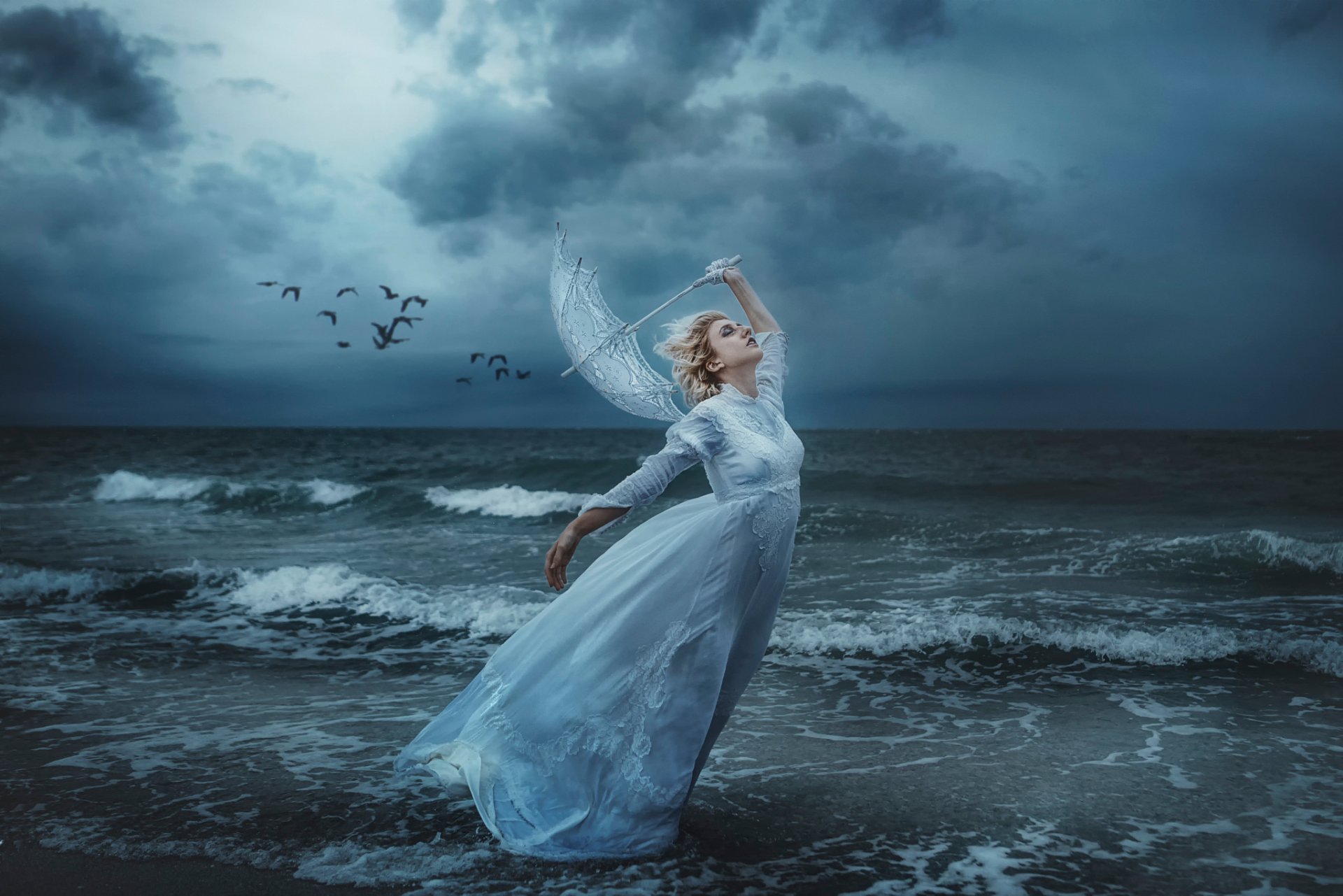 ave me ragazza mare costa tempesta ombrello vento uccelli tj drysdale