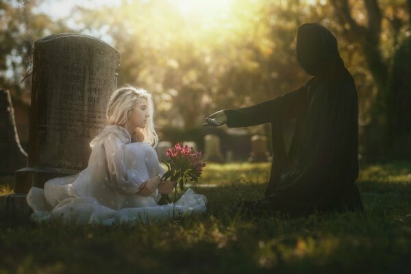 A girl in a white dress at the cemetery