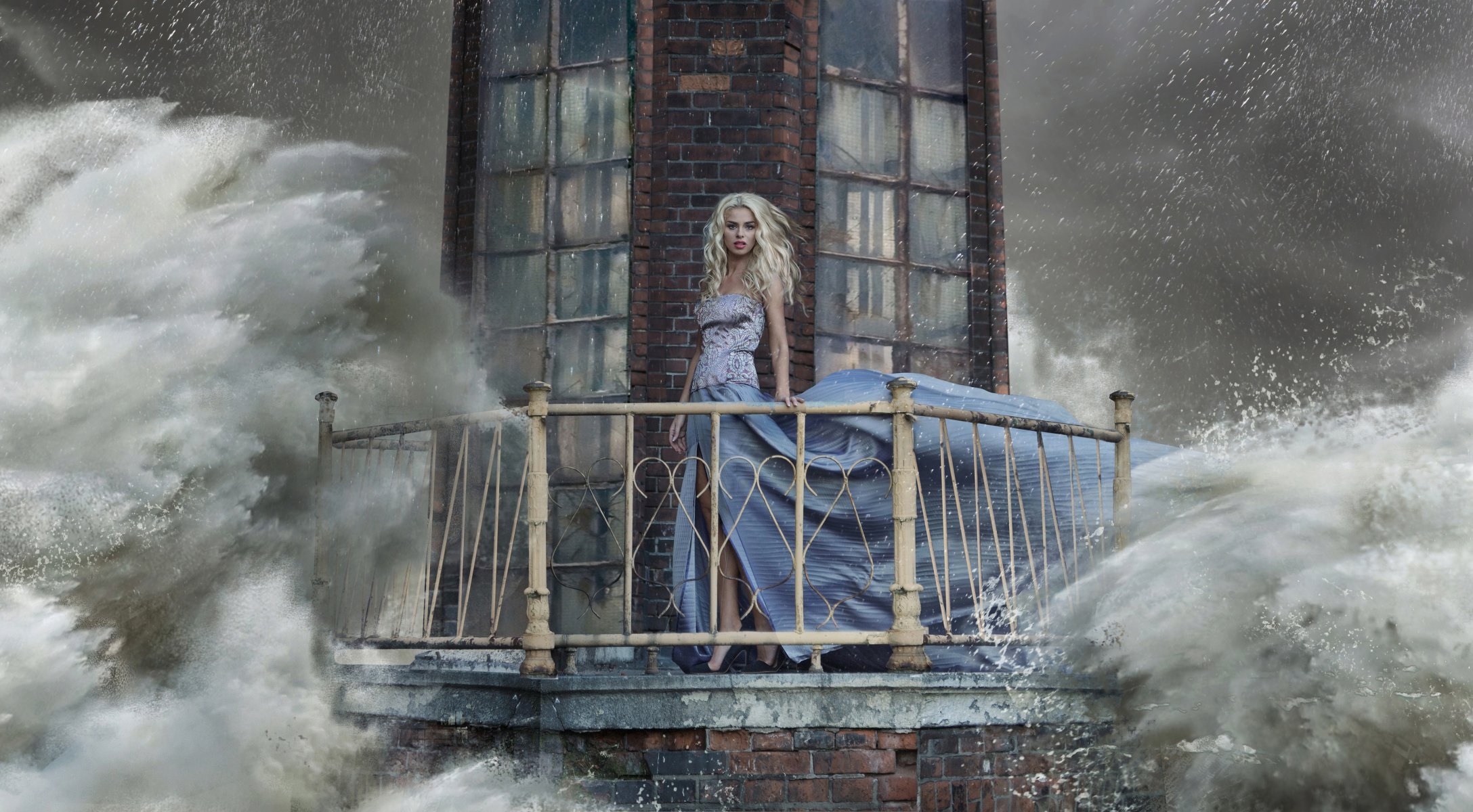 girl blonde dress lighthouse storm waves spray water