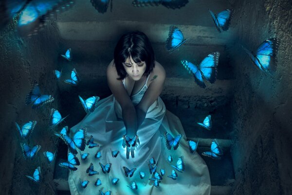 Girl in white and neon butterflies