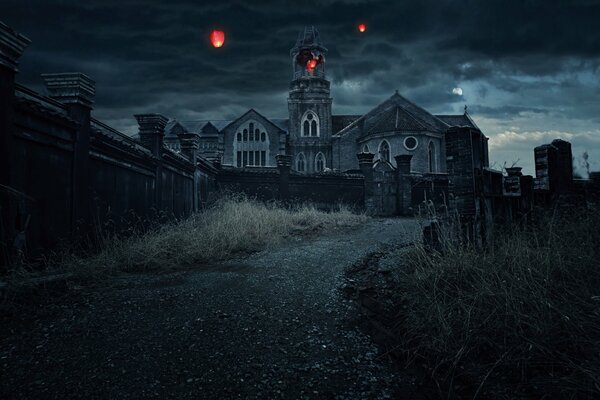 Photo of a night monastery with lanterns in the sky