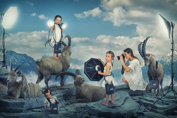 Nachahmung eines Foto-Shootings für Kinder und Tiere in den Bergen