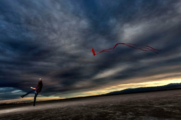 A girl launches a kite