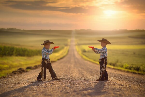 Twin children play on the road