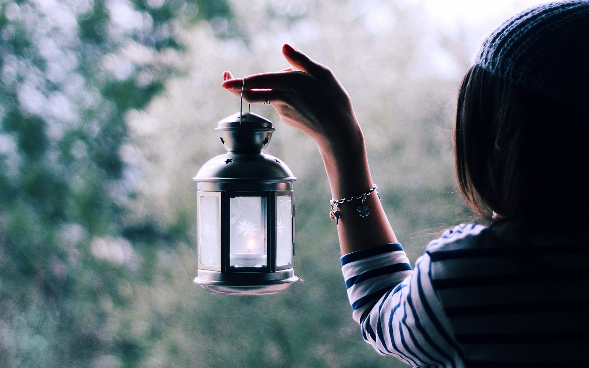 girl lantern hand bracelet hair light blur glare mood