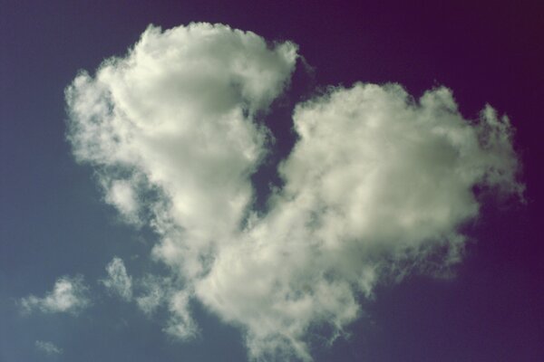 There is a cloud in the sky in the form of a broken heart