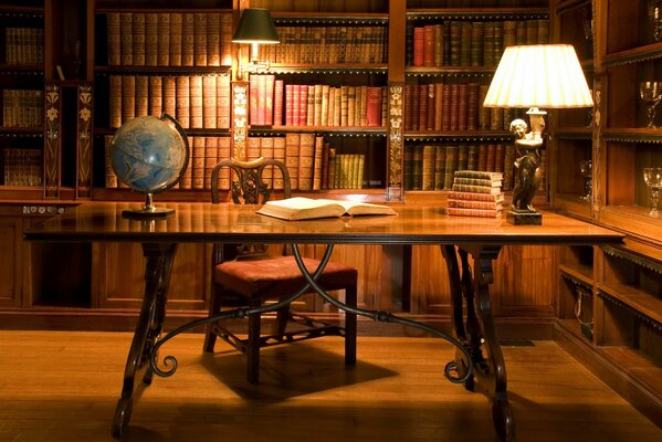 An old library with a globe and glasses