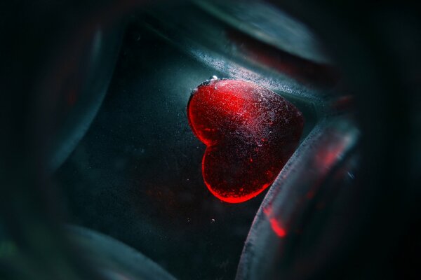 Red glass heart. Burning Heart